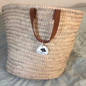 NWT. Natural Woven Tote with Brown Leather Handles from Gum Tree store